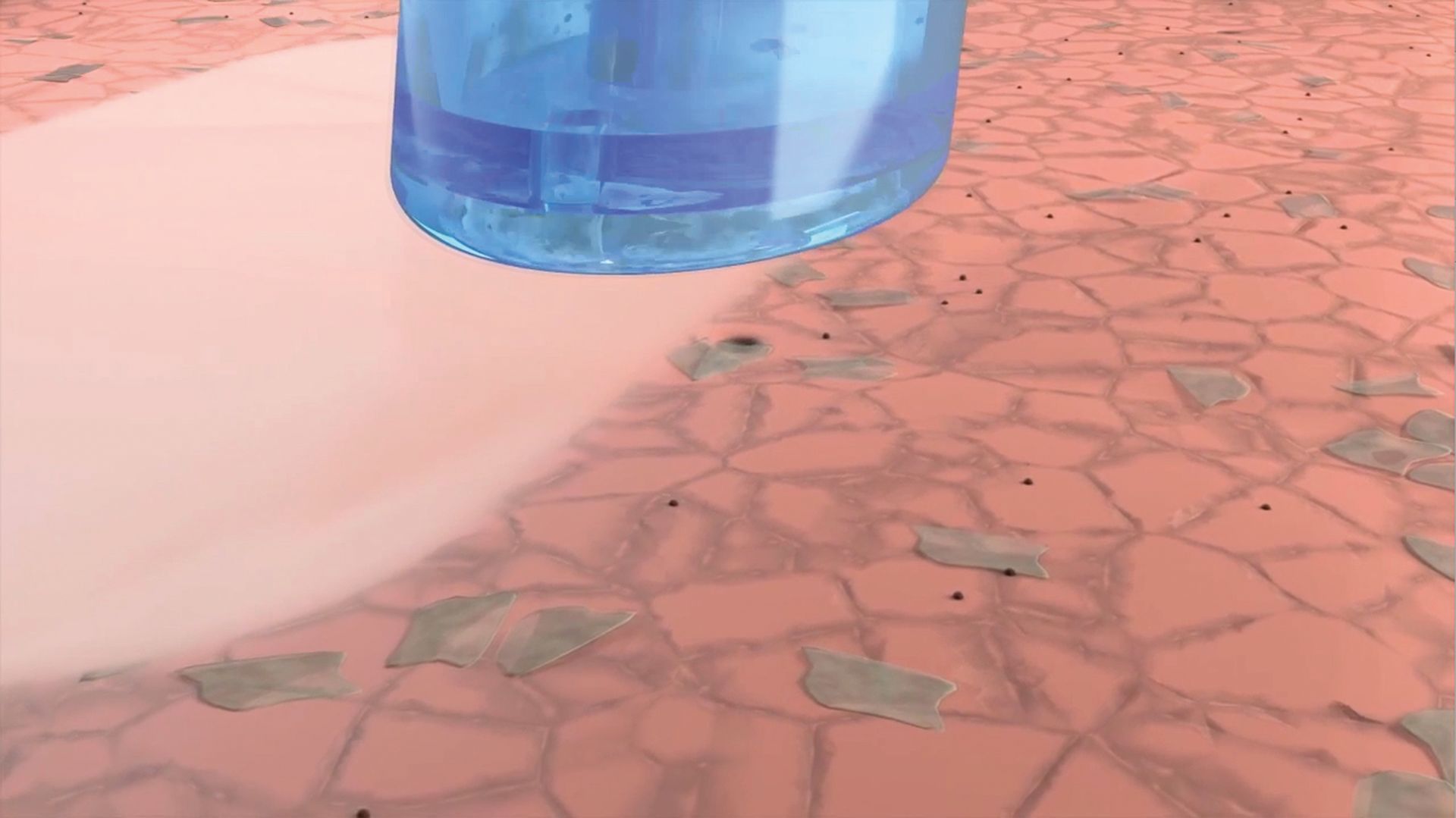 Ein blaues Reinigungswerkzeug verteilt eine dicke, rosa Creme auf einer trockenen, rissigen, rötlich-braunen Bodenfläche.