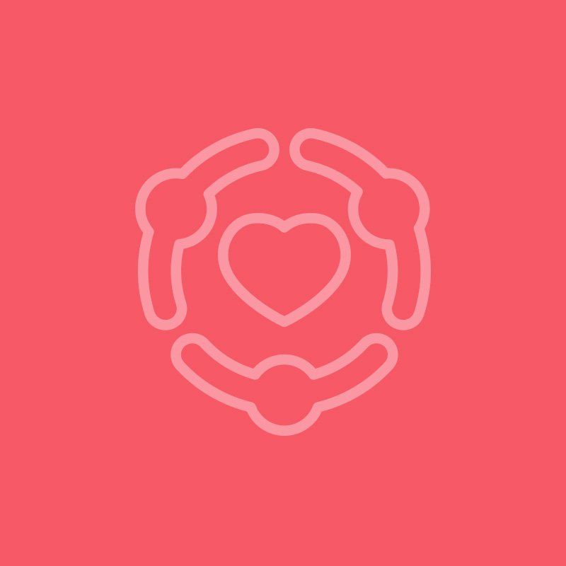 A group of people are holding hands around a heart.
