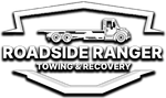 a roadside ranger towing and recovery logo with a truck on a trailer .