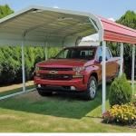 Red pickup truck parked under a white carport beside a red-roofed structure
