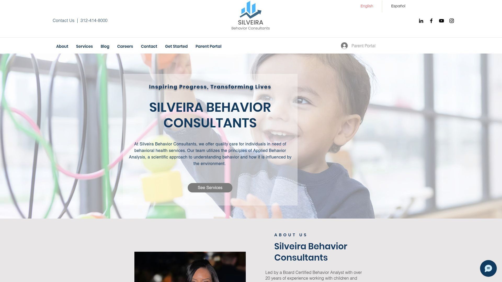 Website homepage with a child playing with toys; Silveira Behavior Consultants.