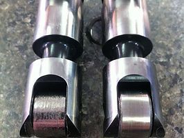 Two Metal Cylinders Are Sitting Next to Each Other on a Table — Darwin Auto Mobile Care in Woolner, NT