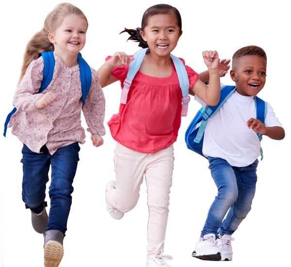 Three children with backpacks are running together and smiling