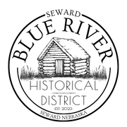 Blue River Historical District logo featuring a log cabin, Seward Nebraska.