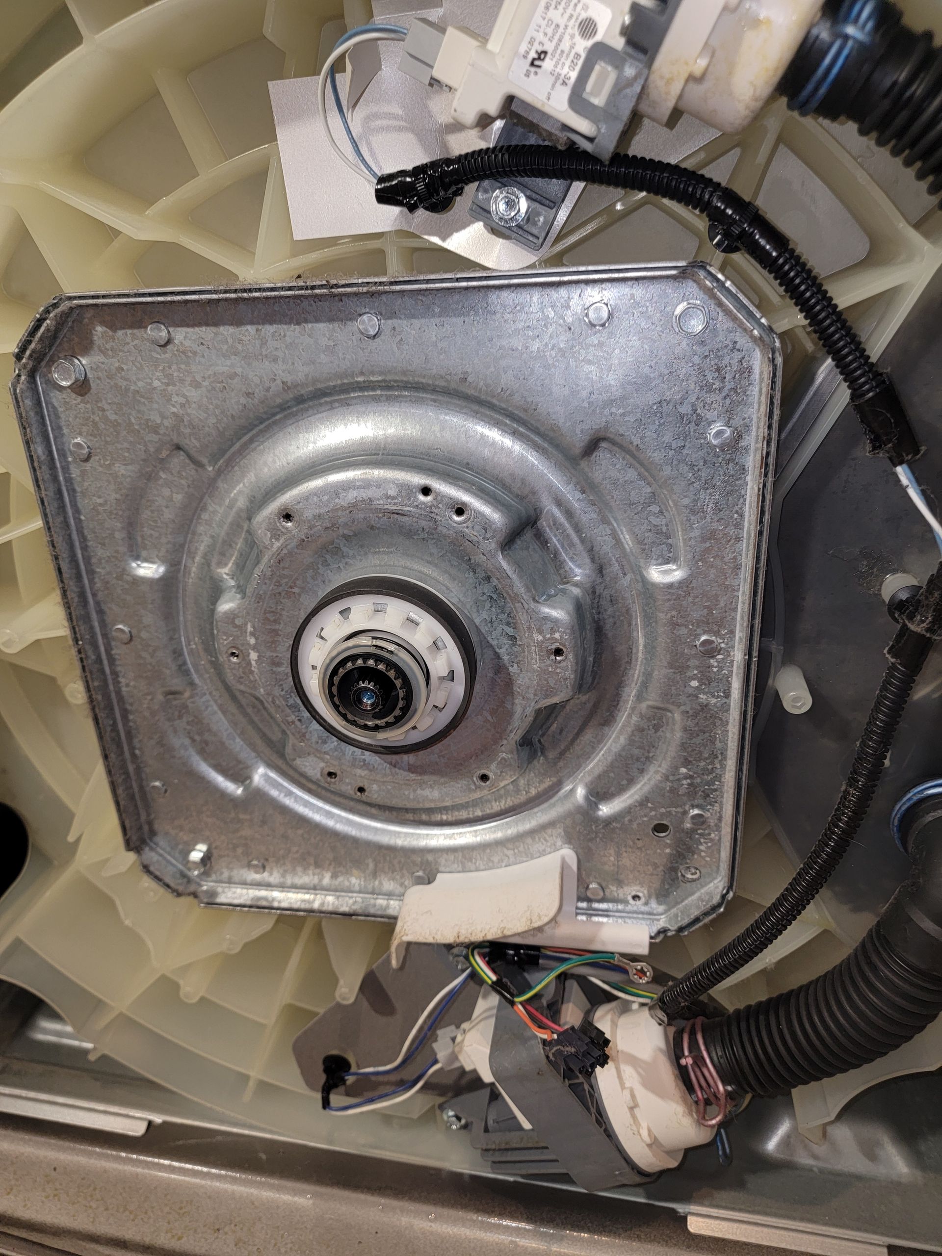 A close up of the inside of a washing machine.