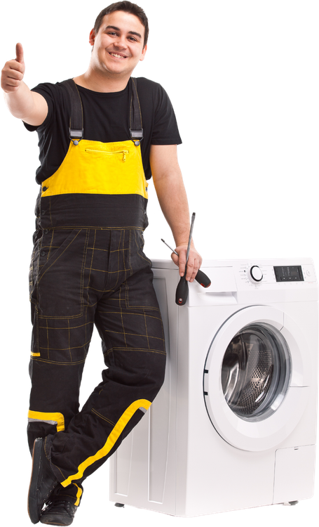 A man is standing next to a washing machine and giving a thumbs up