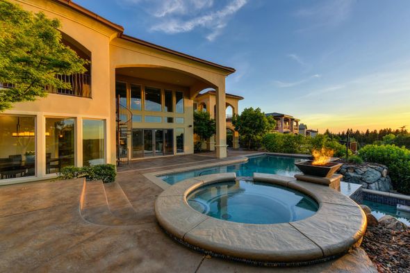 Beautiful custom stamped concrete pool deck installation Frederick MD