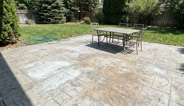 A beautiful stamped concrete patio built by Frederick Stamped Concrete in a local backyard.
