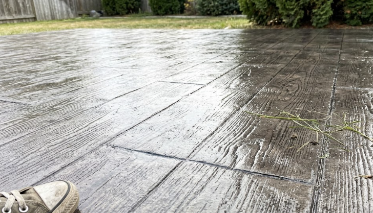 Close up detail of beautiful wood plank stamped concrete poured by local contractors.
