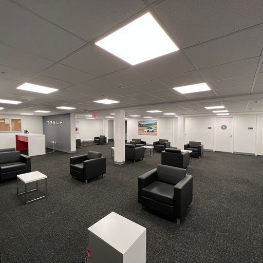 A large room with a lot of chairs and tables