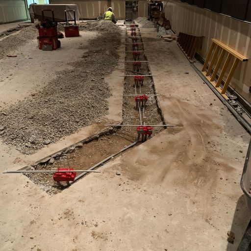 A construction site with a ladder in the background