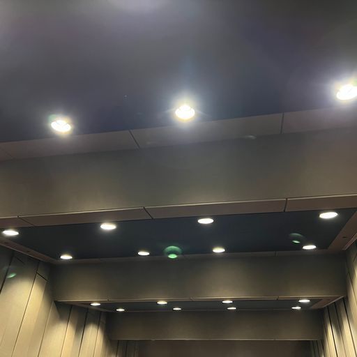 A ceiling with a lot of lights on it