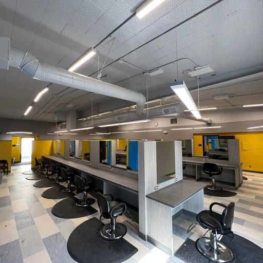 A large room with a lot of chairs and tables