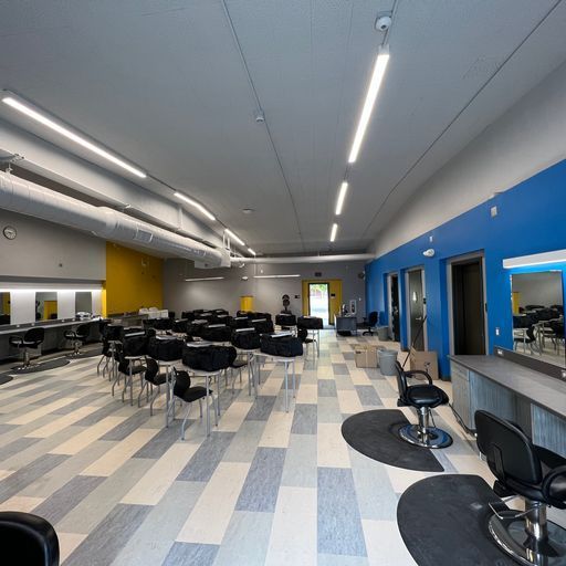 A large room with a lot of chairs and tables
