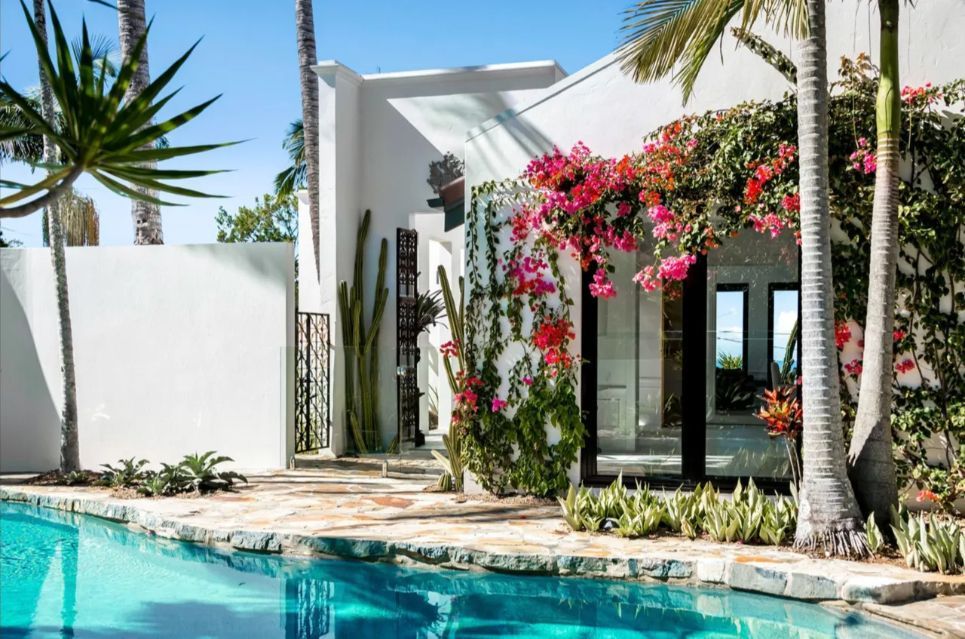 A Large Swimming Pool Is in Front of A White House Surrounded by Palm Trees — MJ Render in Buderim, QLD