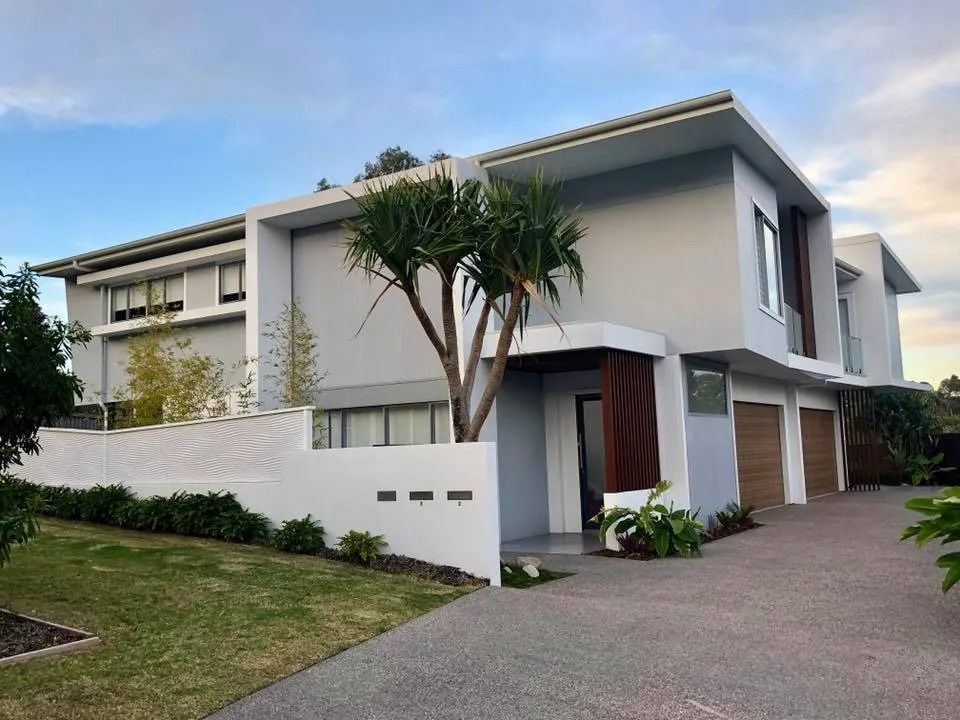 A Large House with A Tree in Front of It — MJ Render in Buderim, QLD