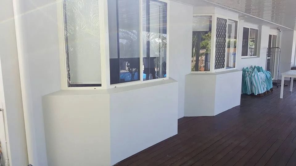 A Long Hallway with A Lot of Windows and A Wooden Floor — MJ Render in Buderim, QLD