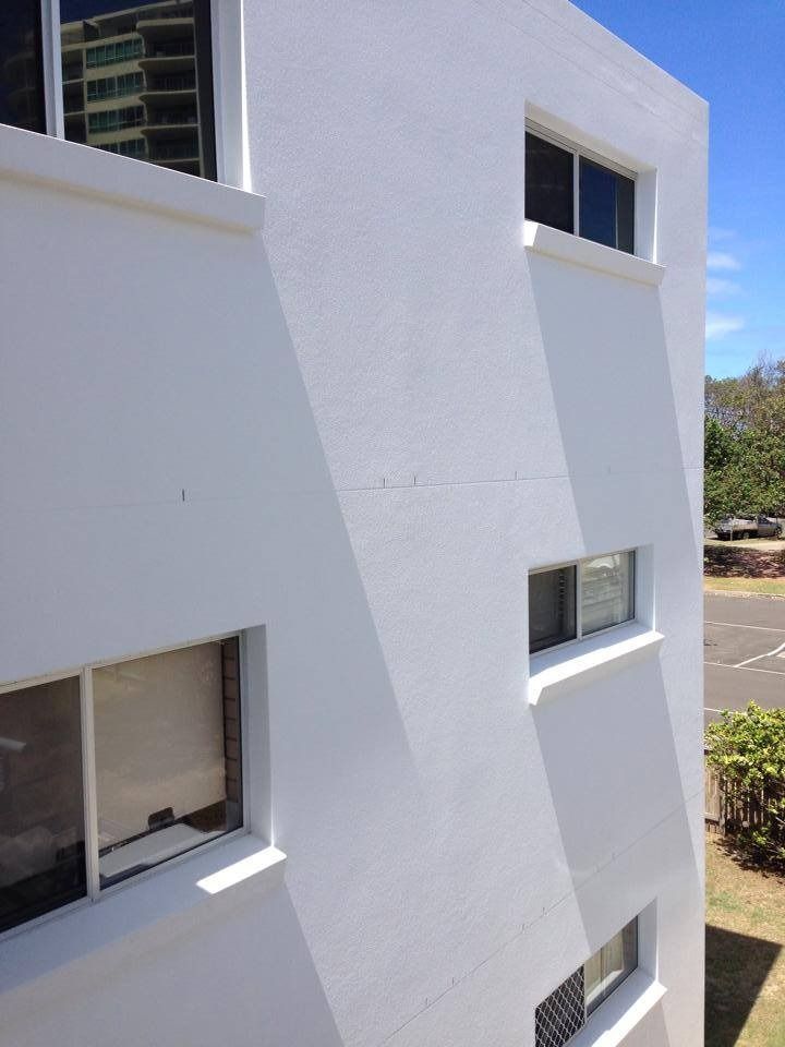 A White Building with A Lot of Windows on It — MJ Render in Buderim, QLD