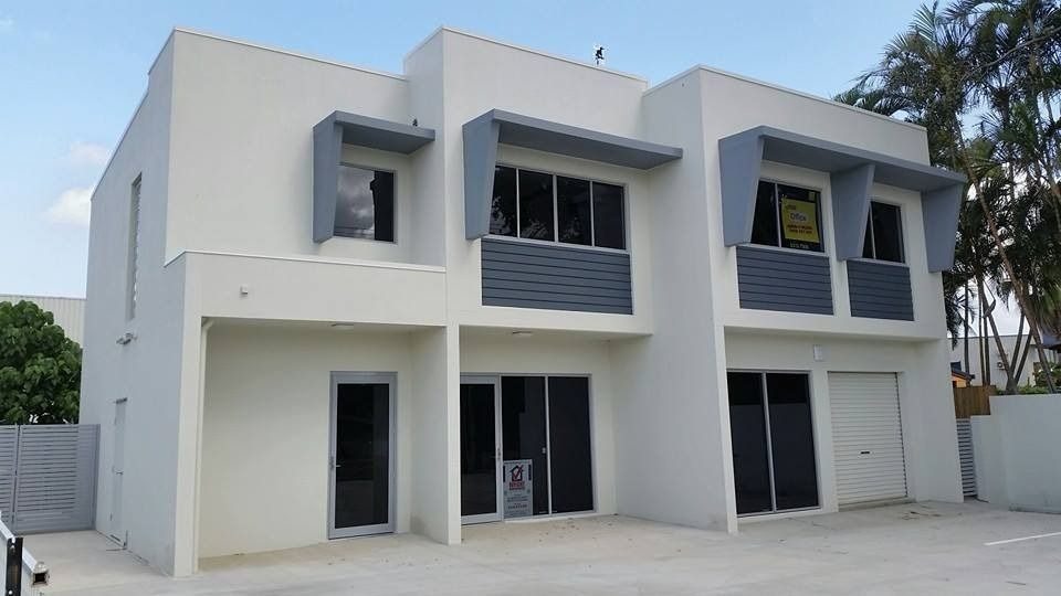A White Building with A Lot of Windows and Doors — MJ Render in Buderim, QLD