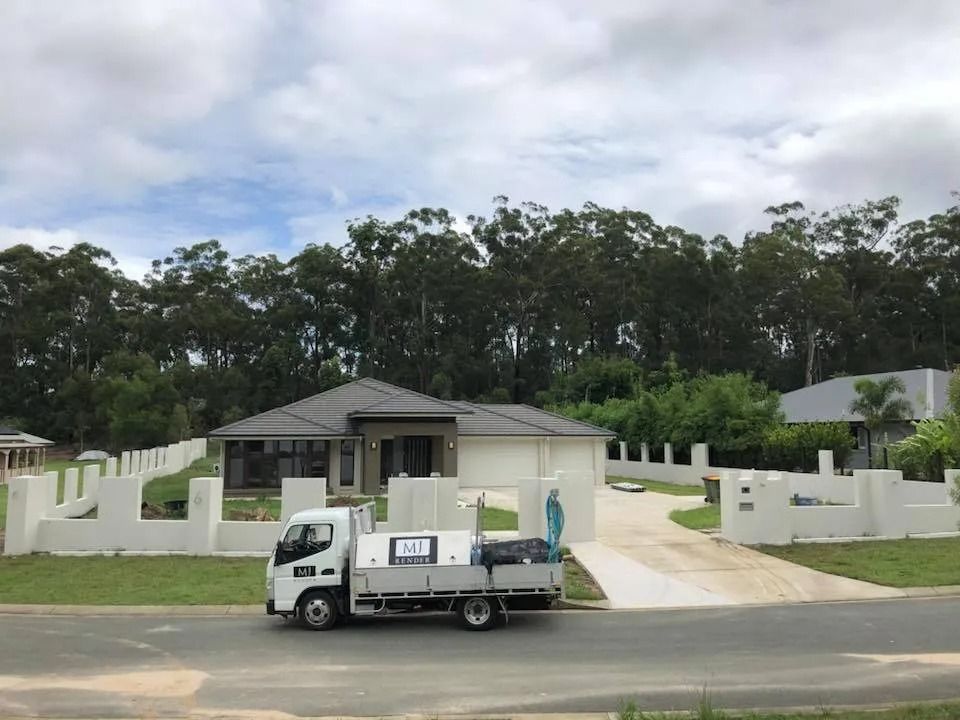 A White Truck Is Parked in Front of A House — MJ Render in Buderim, QLD