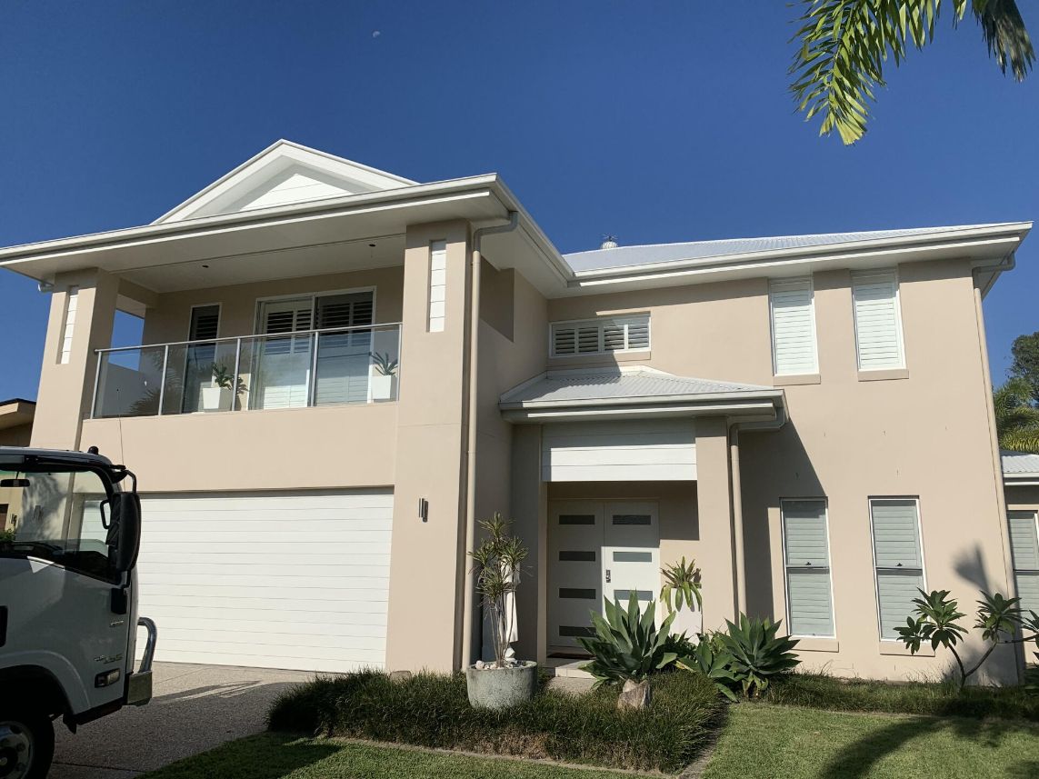 A Large House with A White Truck Parked in Front of It — MJ Render in Buderim, QLD