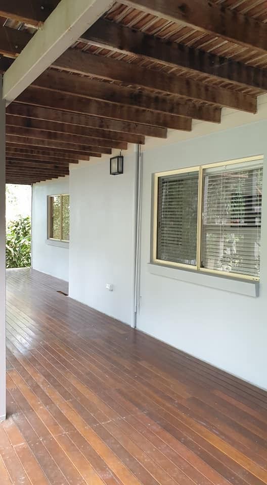An Empty Porch with A Wooden Floor and A White Wall — MJ Render in Buderim, QLD