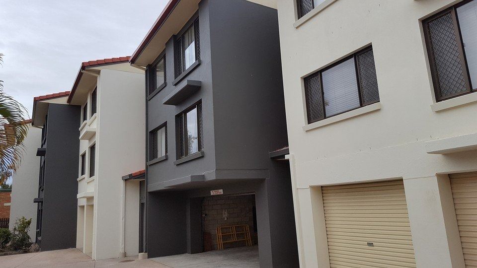 A Row of Apartment Buildings with Garages in Front of Them  — MJ Render in Buderim, QLD