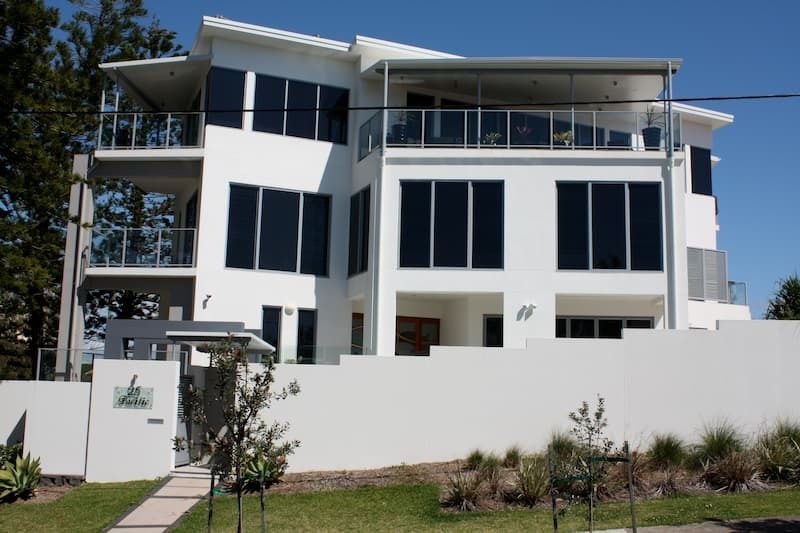 A Large White House with Lots of Windows and Balconies — MJ Render in Buderim, QLD