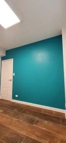 A Room with A Blue Wall and A Wooden Floor — MJ Render in Buderim, QLD