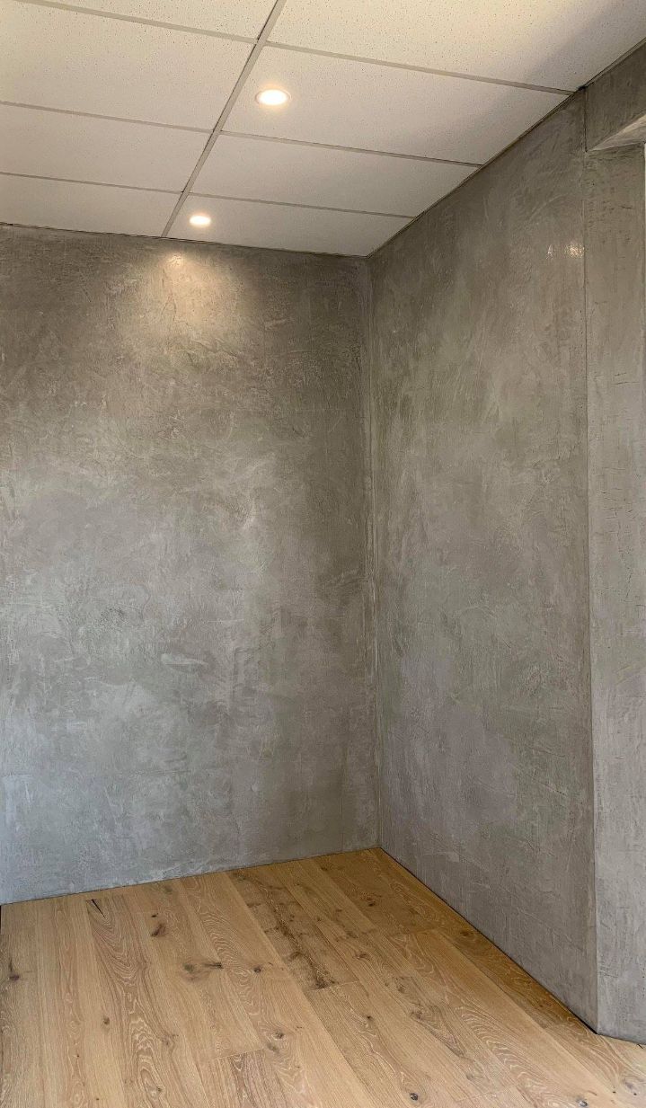 An Empty Room with Concrete Walls and Wooden Floors — MJ Render in Buderim, QLD