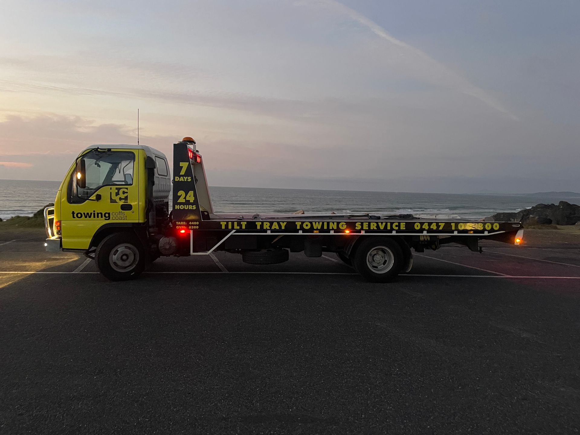 4WD Muddy Ute being towed— TCC Towing Coffs Coast in Harbour, NSW