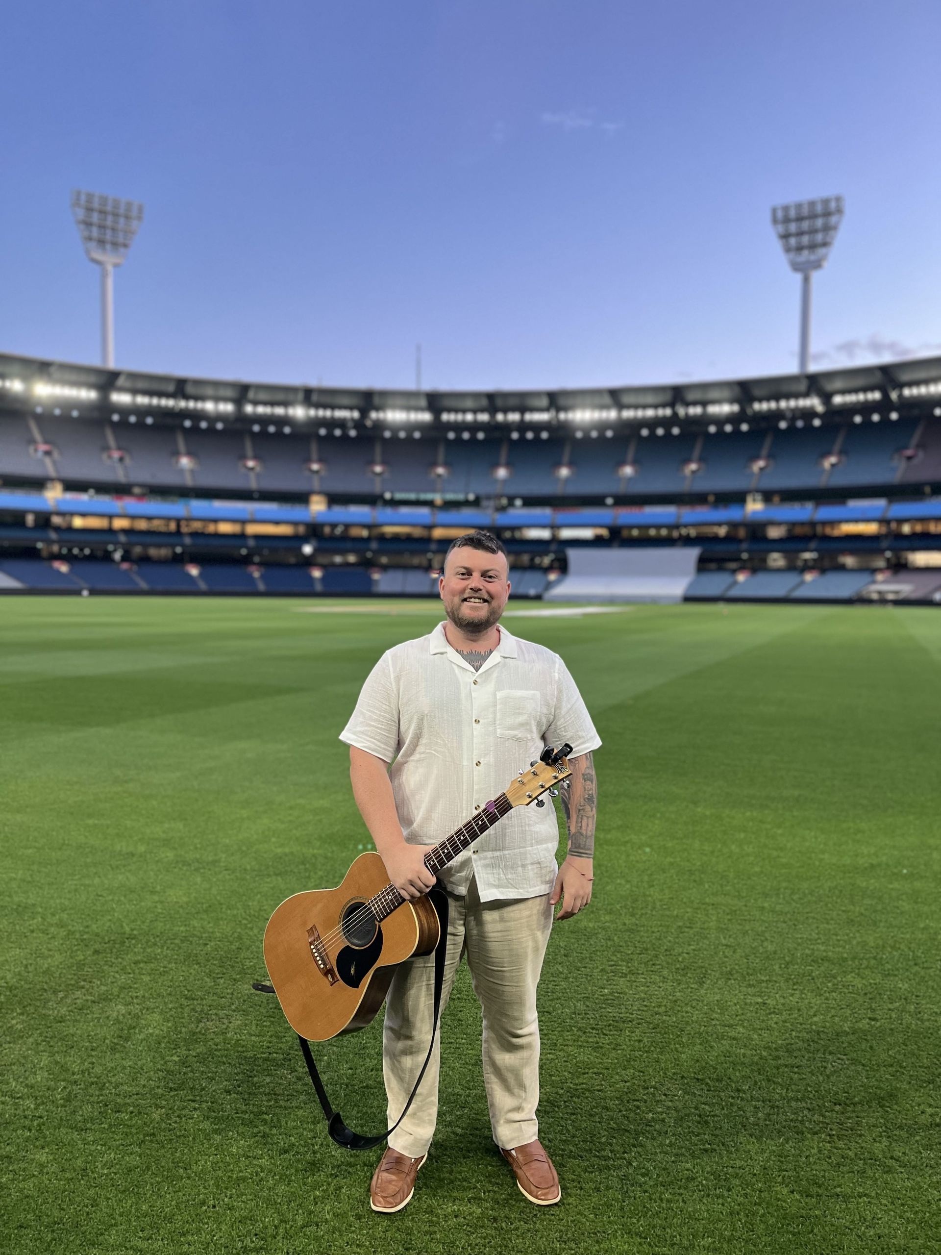 Wedding crowd dancing to live DJ in Melbourne venue