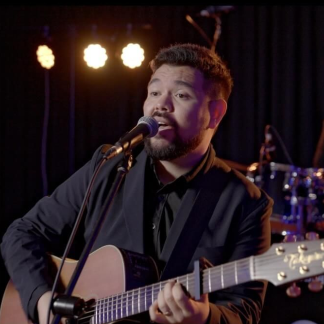 Brisbane live music duo The Dannies Duo entertaining guests at a party