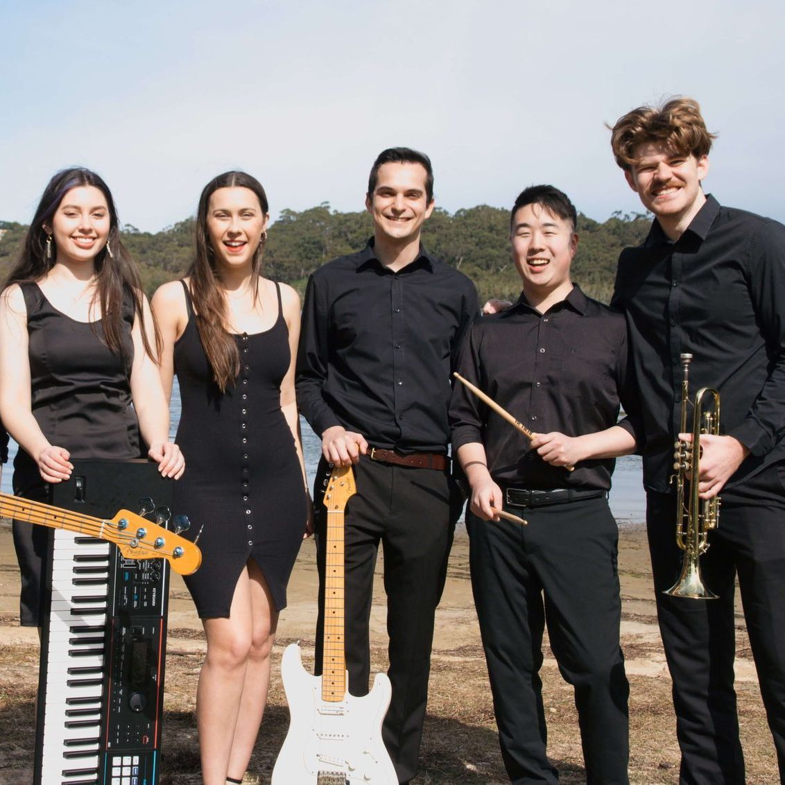 the q.c. collective wedding band