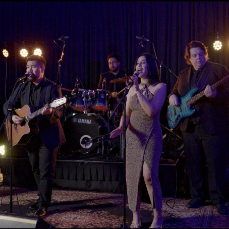 The Dannies Duo performing live music at a corporate event in Brisbane