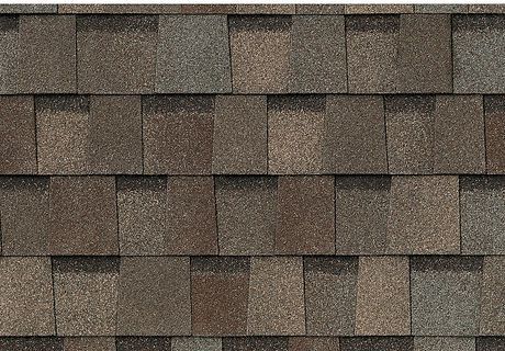 A close up of a roof with shingles on it.