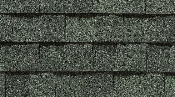 A close up of a roof with shingles on it.