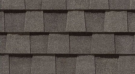 A close up of a roof with shingles on it.