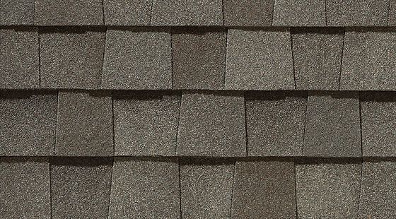 A close up of a roof with shingles on it.