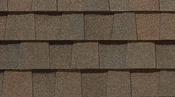 A close up of a roof with shingles on it.
