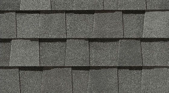 A close up of a roof with shingles on it.