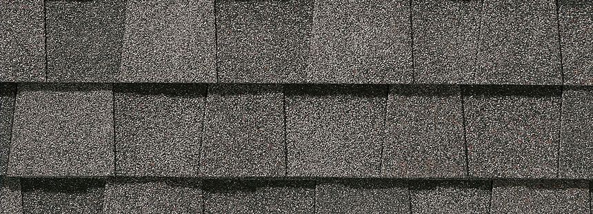 A close up of a roof with shingles on it.
