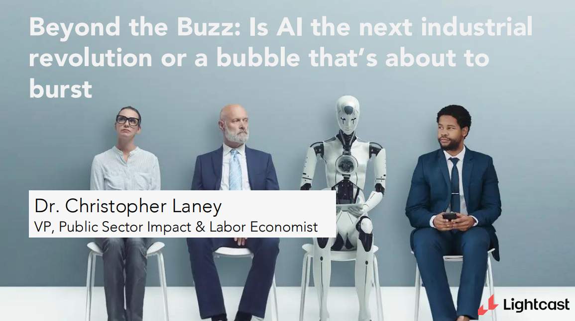 Panel discussion slide: “Beyond the Buzz: Is AI the next industrial revolution or a bubble?” with four speakers onstage