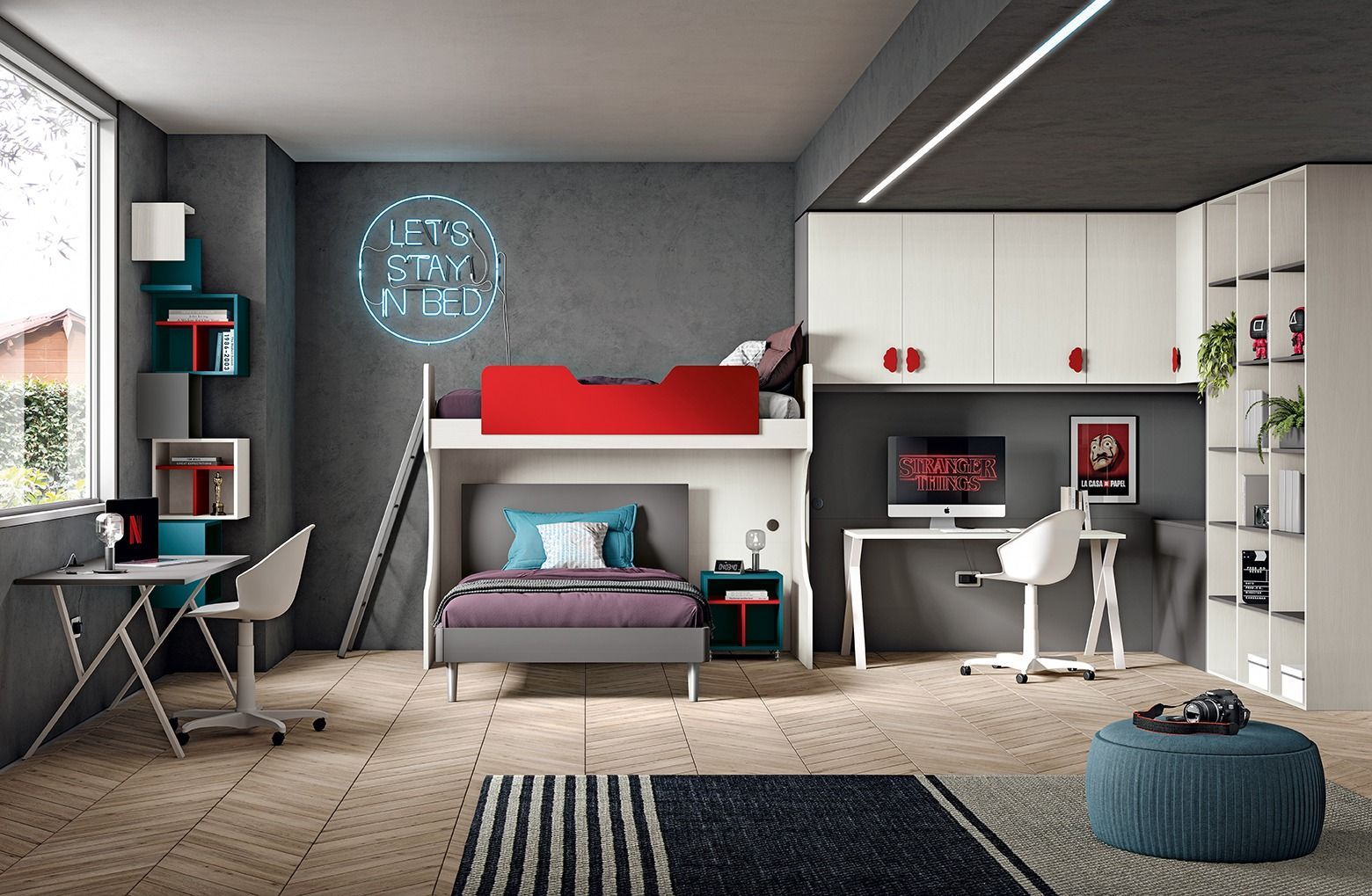 Una camera da letto con letto a castello, scrivania e computer.