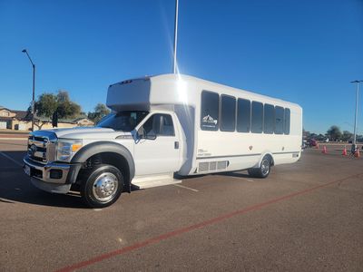 WHITE TUXEDO LIMO BUS - F-550