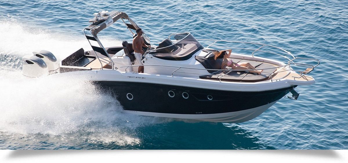ranieri next 370 SH Speedboat racing across blue water, with passengers aboard and spray splashing behind.
