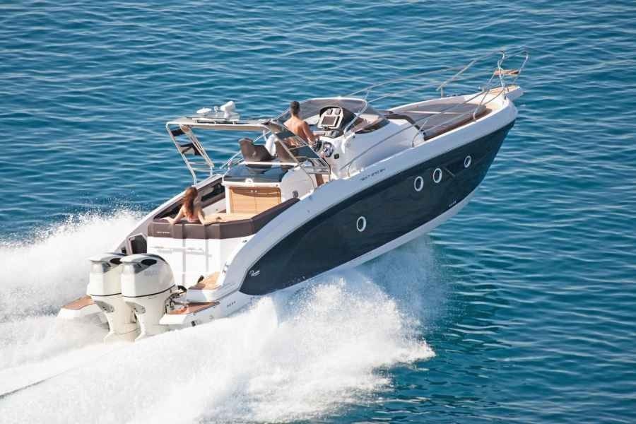 ranieri next 370 SH Speedboat speeding across blue water, leaving a white wake.