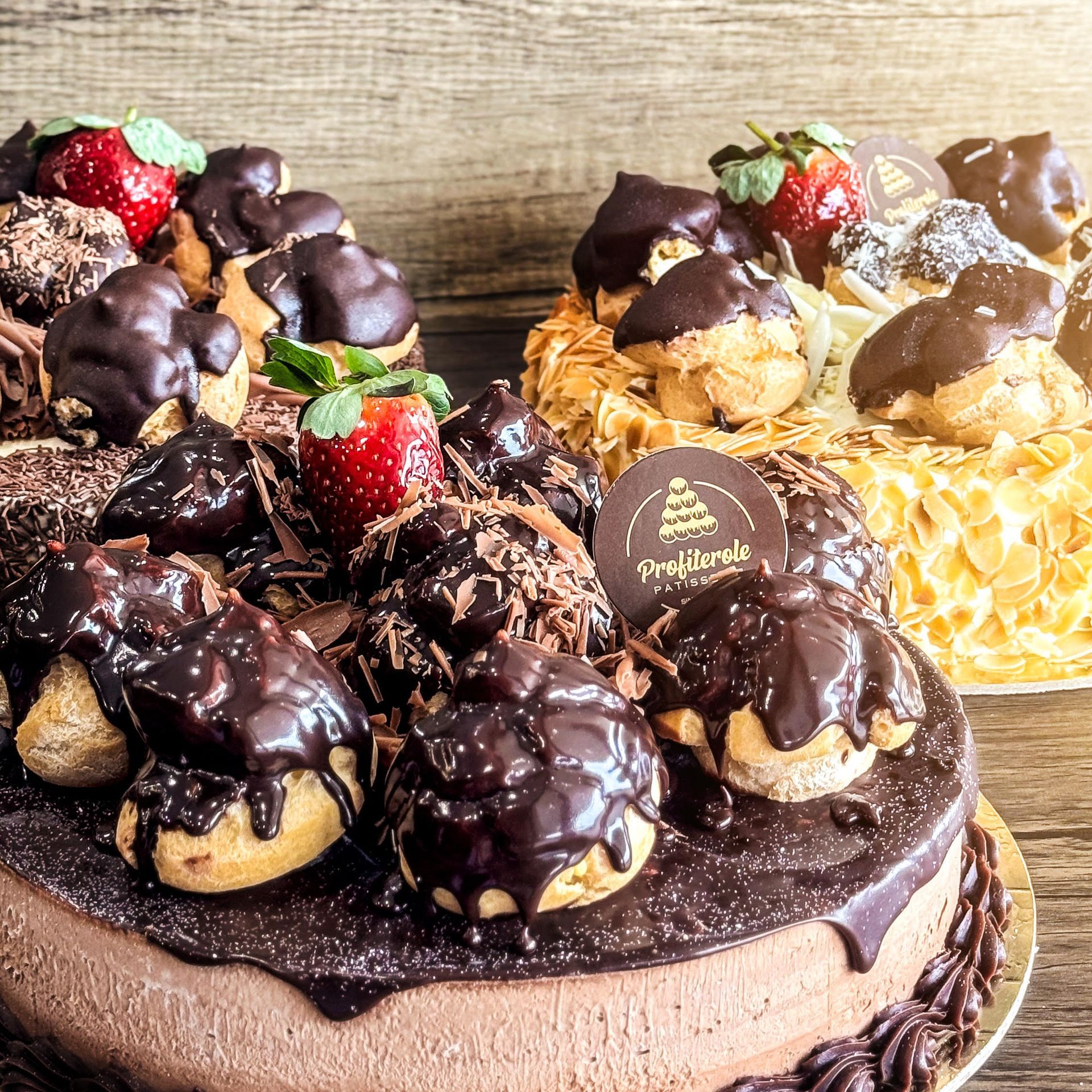 three profiterole cakes