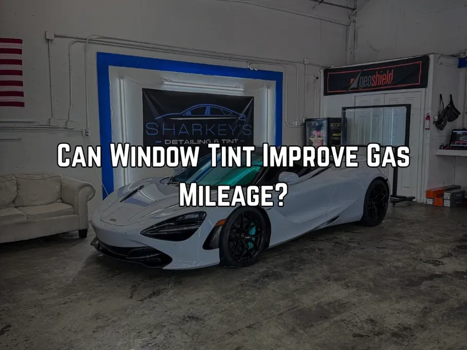 A tinted car image displaying a text that reads Can Window Tint Improve Gas Mileage