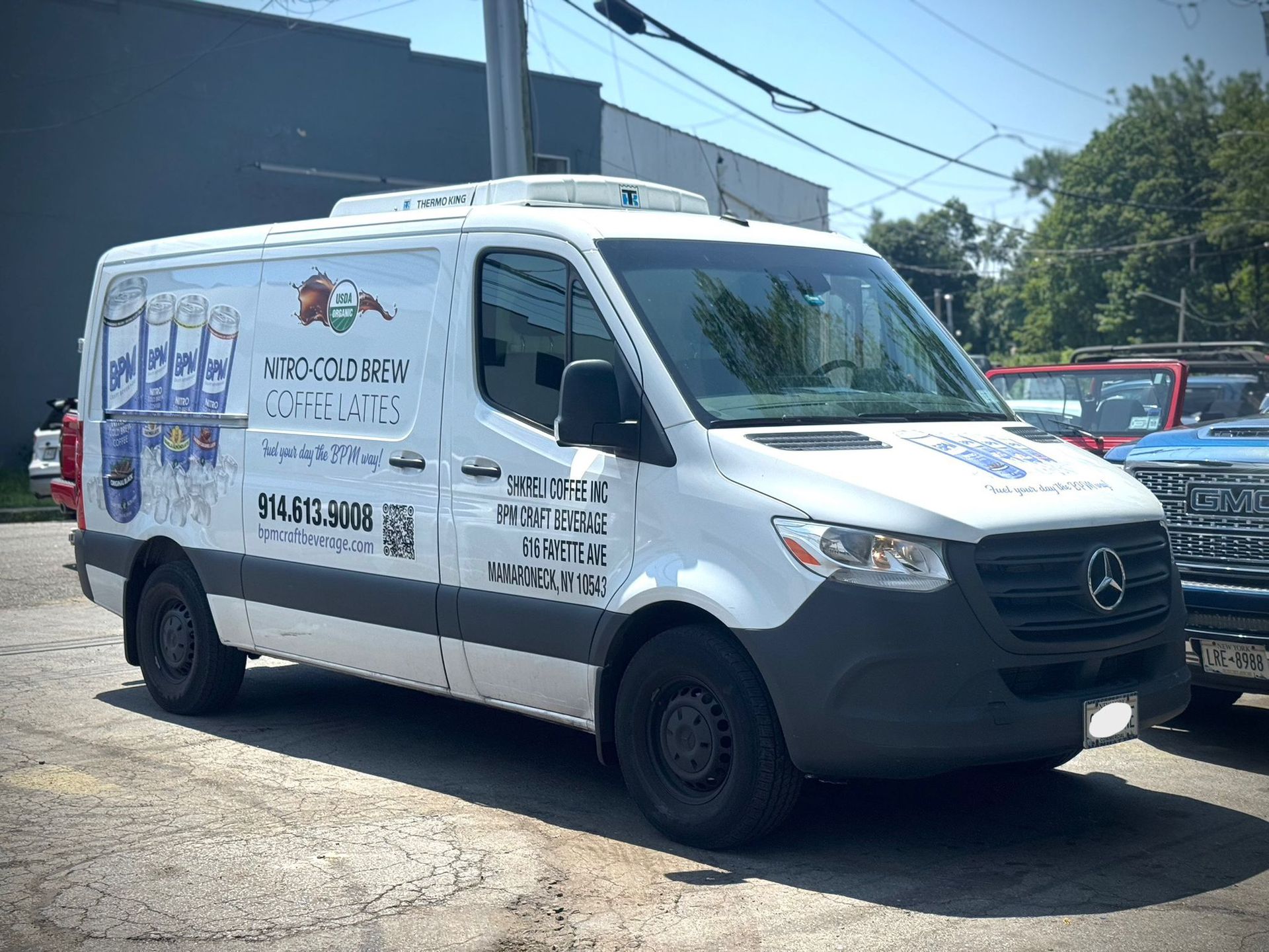 White Mercedes Sprinter van.
